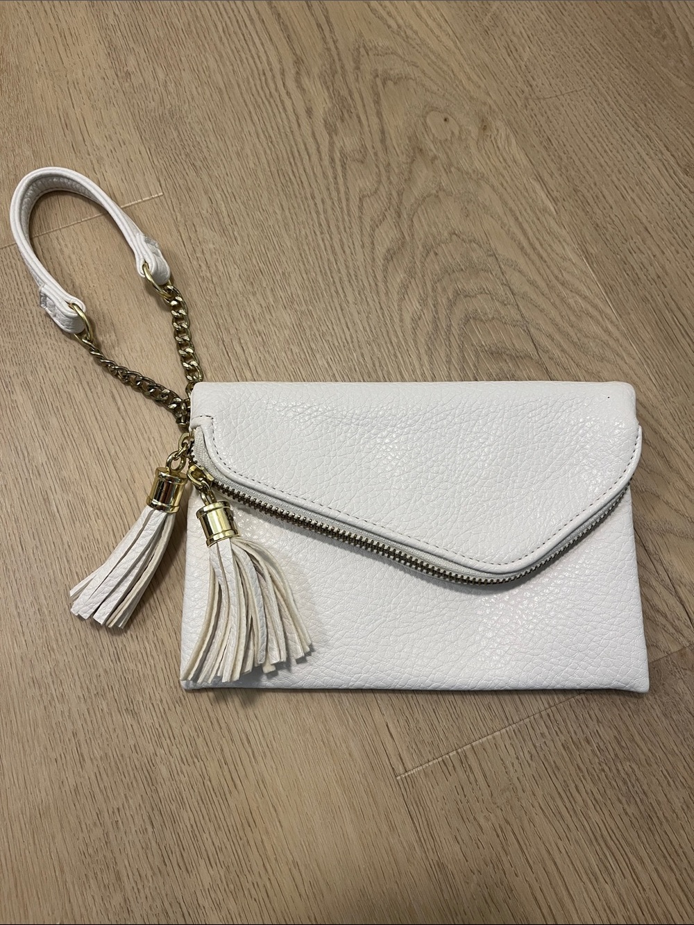 White Leather Wristlet Clutch with Tassel Accent